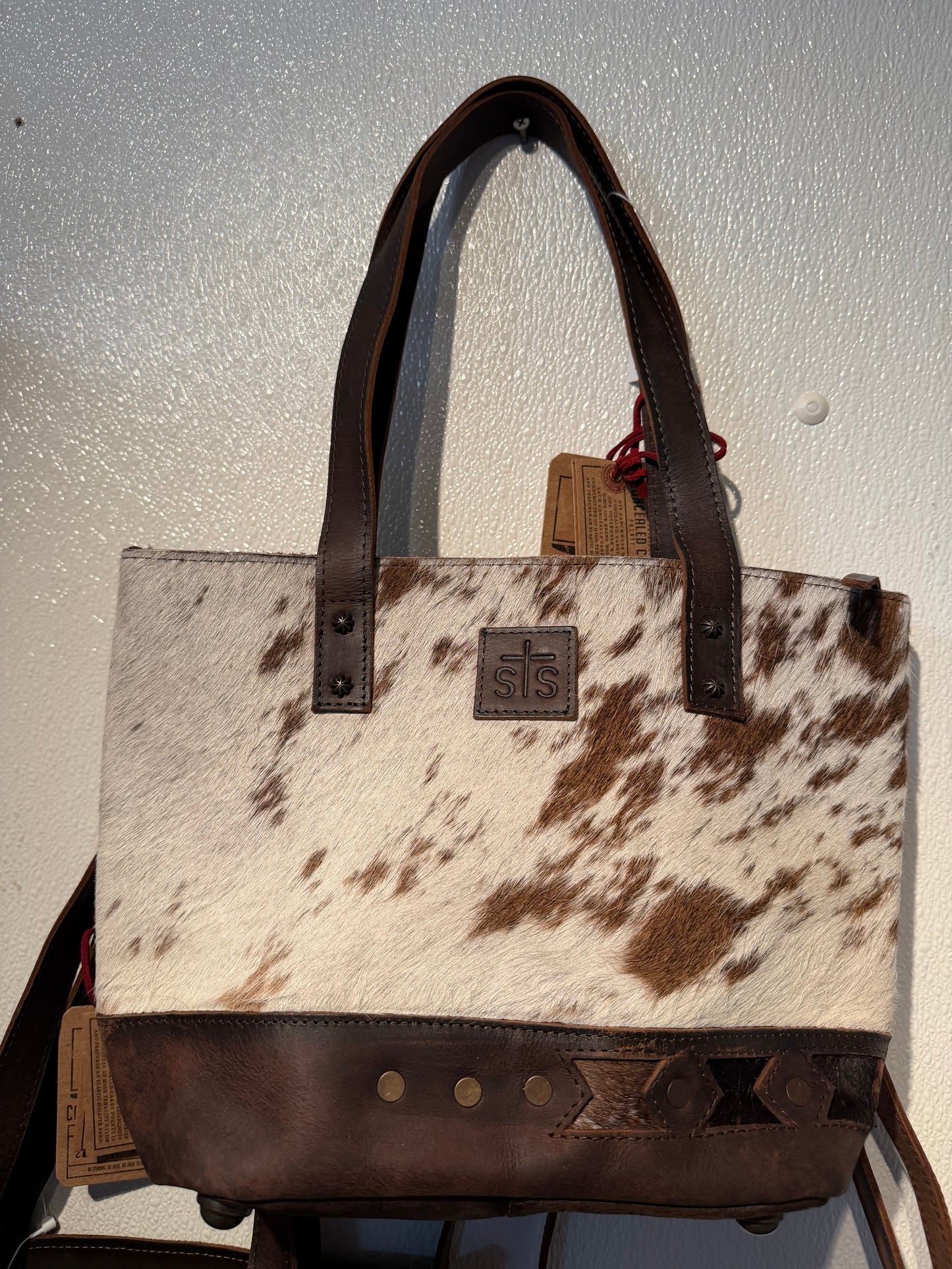Roswell cowhide purse