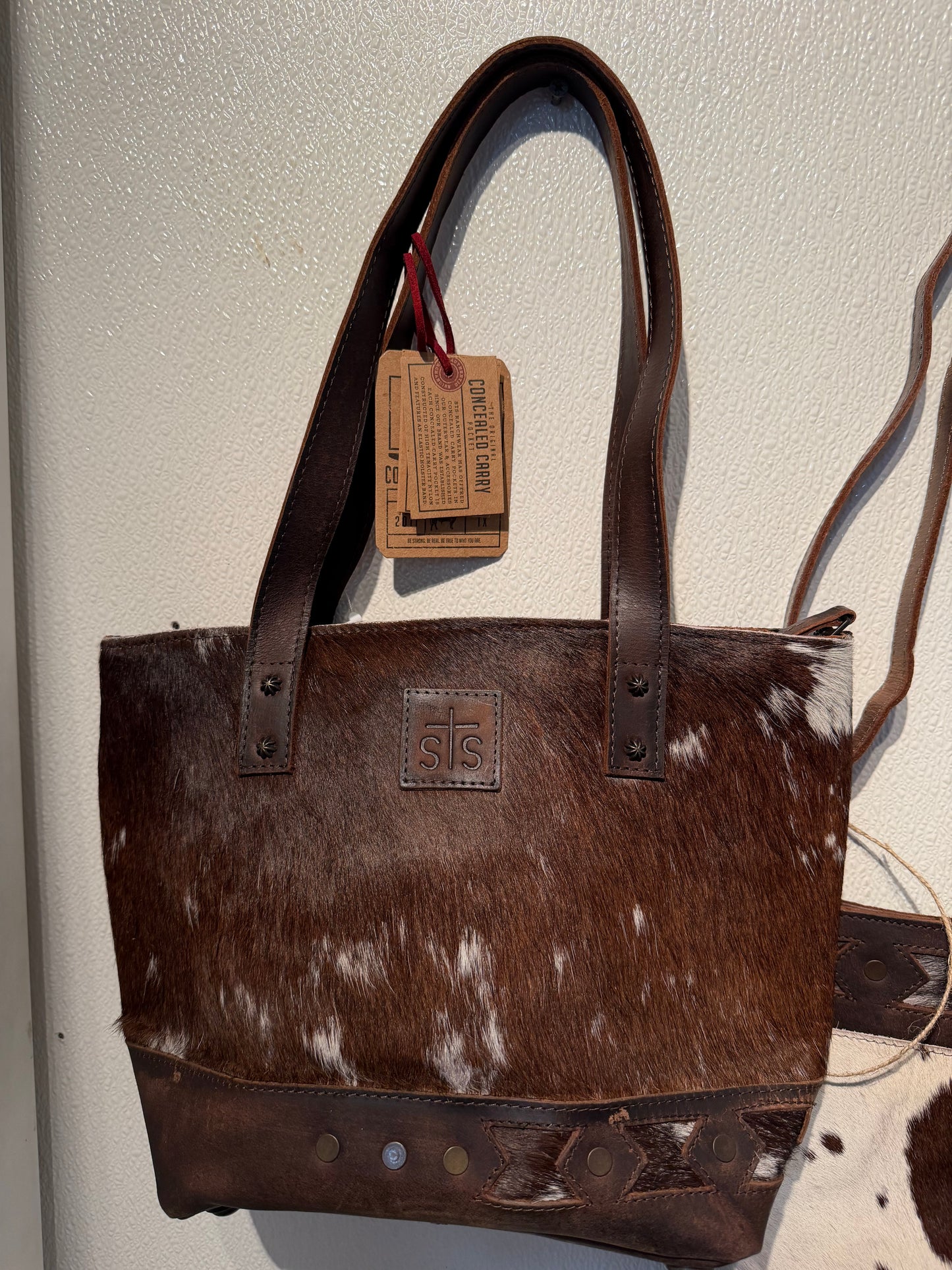 Roswell cowhide purse